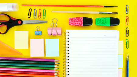 Stationery colorful writing tools accessories pens pencils, color paper. Back to school. Office supplies products. Top view. Flat layの写真素材
