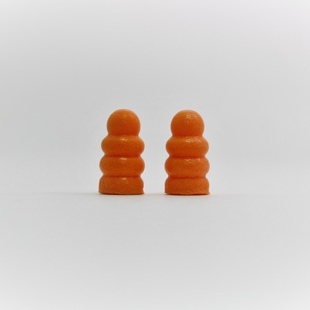 ear plugs orange colorの写真素材