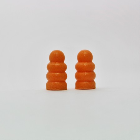 ear plugs orange colorの写真素材