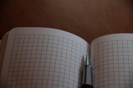 Notepad and penの写真素材