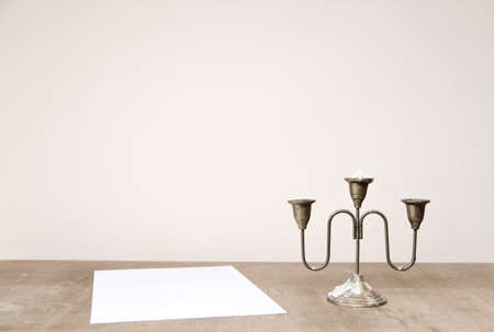 candle holder on a wooden tableの写真素材