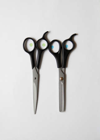 hairdressing scissors on the desktopの写真素材