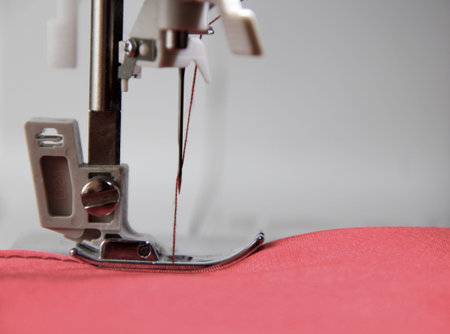 sewing machine and red material