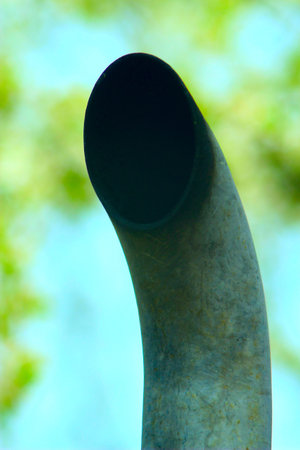 Tractor exhaust pipe polluting the environment