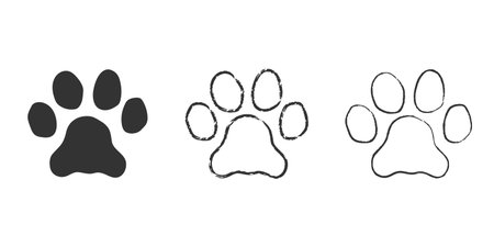 Hand drawn Paw print set. Outline doodle paw icon. Vector illustration isolated on white backgroundのイラスト素材