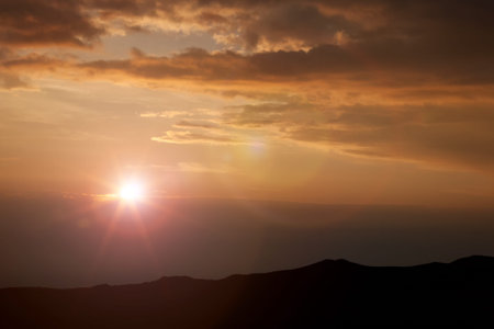 Beautiful red dawn of the sun in the mountains.