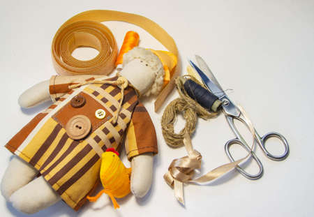 handmade doll "Farmer", thread, scissors, set for needlework and sewing toysの写真素材