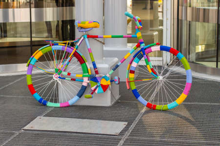 Rainbow bike decorated with colored threads, transport decorated in the hippie boho style. Beautiful bicycles no peopleの写真素材