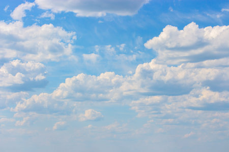 Cloudy weather, blue sky with cumulus clouds, cloudscape background wallpaper backdrop. Natural sky...