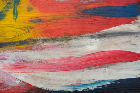 Colored stripes of red white paint on wooden board horizontal photography, textured background for...