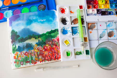 Beautiful poppies field, watercolor in sketchbook.の写真素材