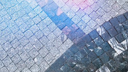 Background with cobbled pavement with pink toning. Wallpaper with copy space. Pavement texture....