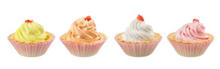 Colorful cream cakes isolated on white backgroundの写真素材