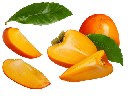 Whole persimmon fruit, half and slices with green leaves set bundle isolated on white backgroundの写真素材