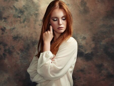 Portrait of beautiful woman with fresh makeup and romantic  hairstyle. Fashion photoの写真素材