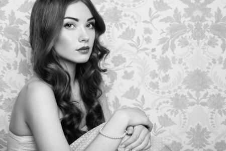 Portrait of young beautiful girl. Fashion photo. Hairstyle. Make up. Vogue Style. Black and white photo.の写真素材