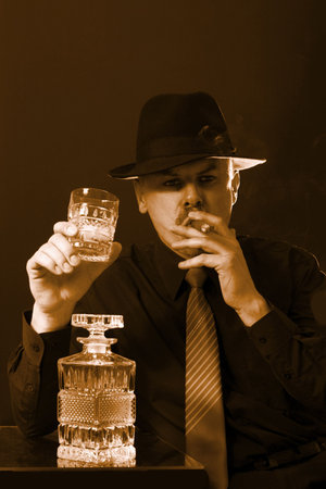 Portrait man in hat glass alcohol and cigar 