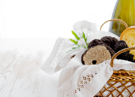 Delisious black truffles in golden basket whith breadの写真素材