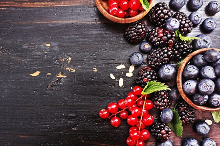 Freshly mixed berries in white bowl. Antioxidant concept.の写真素材