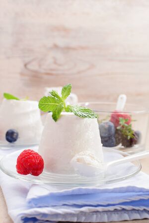 Ricotta with fresh berries, and nuts, fresh berries for breakfast , copy space .の写真素材