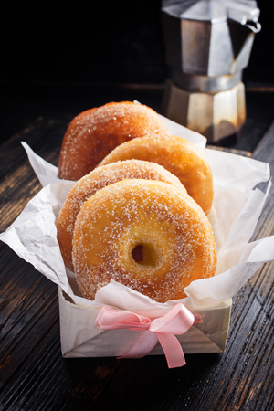Graffe - tipical carnival italian doughnut  on black wooden board, copy space.の写真素材