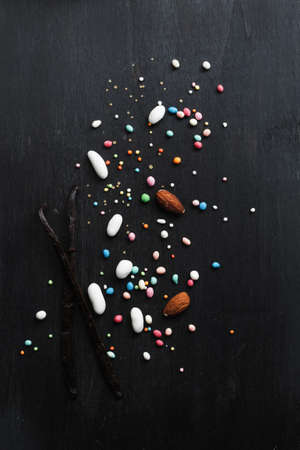 decorative eggs,vanilla bean, spring flowers, top view free text space. Food art idea for  Easter holiday baking background.の写真素材