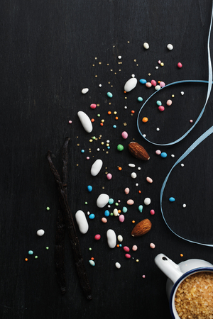 decorative eggs,vanilla bean, spring flowers, top view free text space. Food art idea for  Easter holiday baking background.の写真素材