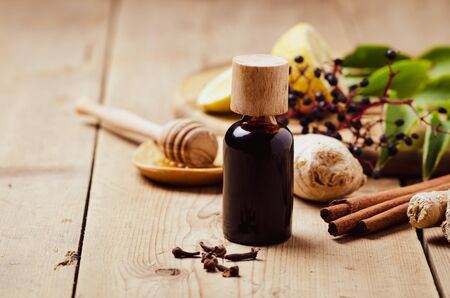 Elderberry syrup with honey, ginger, cinnamon,cloves. Homemade remedy for Immune boosting for flu season, colds.の写真素材