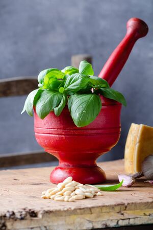 Ingredients  for pesto alla genovese over rustic table.の写真素材