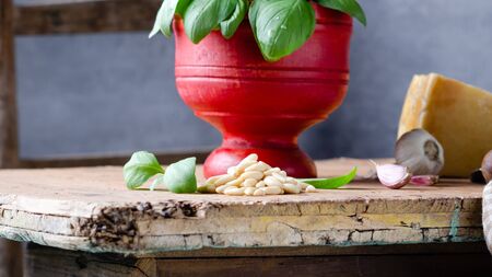 Ingredients  for pesto alla genovese over rustic table.の写真素材