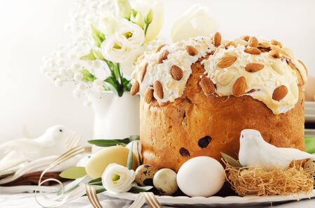 Cake with flowers eggs on white plate.の写真素材