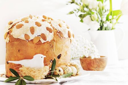 Cake with flowers eggs on white plate.の写真素材