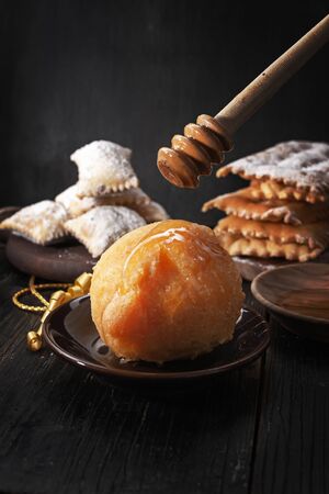 Carnival italian fritters on dark rustic board.の写真素材