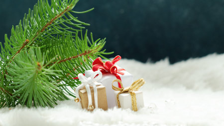 Christmas decorations on a winter snowcovered background. Xmas or New Year greeting card.の写真素材