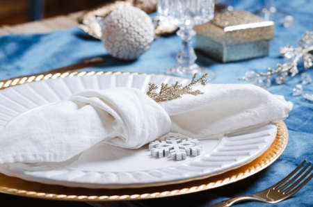 Christmas or New Year table setting. Place setting for Christmas Dinner. Holiday Decorations.の写真素材