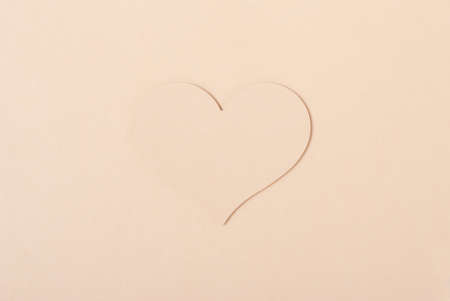 Heart shape of paper on natural color card. Valentines Day, Mother day, concept.With free text space.の写真素材