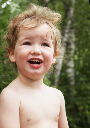 Happy kid laughingの写真素材