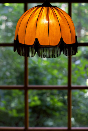 Cosiness of an old yellow lamp shadeの写真素材