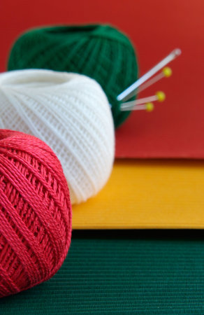 Red, green, yellow -still-life from colourful sewing accessoriesの写真素材