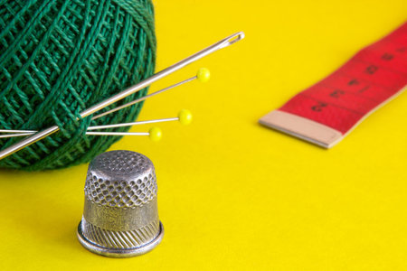 Red, green, yellow -still-life from colourful sewing accessoriesの写真素材