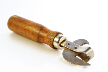 Edge of an old can opener-the decision of problems checked up by timeの写真素材