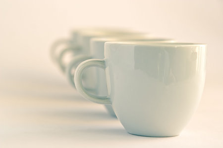 Line of cups backgroundの写真素材