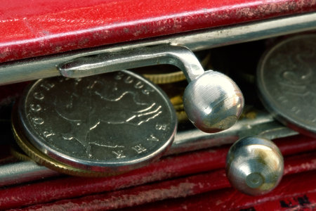 Shabby purse with last coinsの写真素材