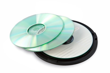 Pile empty compact disks in packing on a white backgroundの写真素材