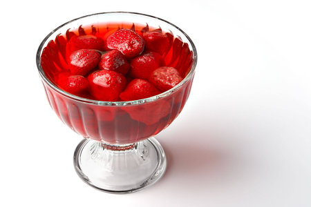 Strawberry dessert in a glass isolated on white backgroundの写真素材