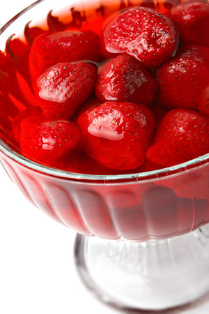 Strawberry dessert in a glass isolated on white backgroundの写真素材