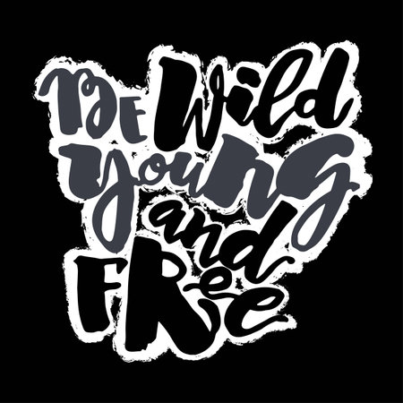 Be wild young and free motivation inscription.Ink artistic modern brush calligraphy print.のイラスト素材