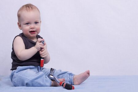 Funny little boy with building tools. Copy spaceの写真素材