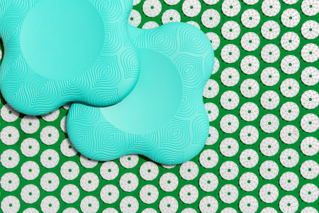 Massage acupressure mat with colored yoga accessory. Acupuncture concept.