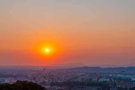 Time lapse of a sunset one hour in seven seconds. Red sunset over an urban city.の写真素材